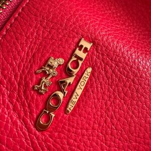 Coach Red/bright pinkish Leather Bag with Gold Hardware and Textured Finish